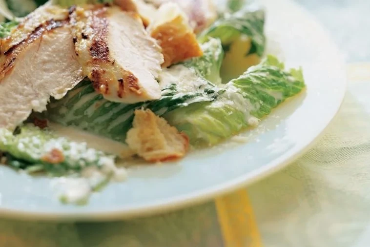 Grilled chicken on the plate looks mouth-watering.