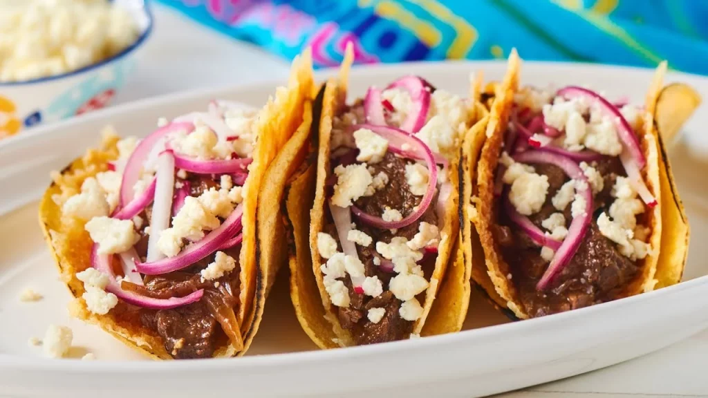 Steak tacos with cheese and veggies 