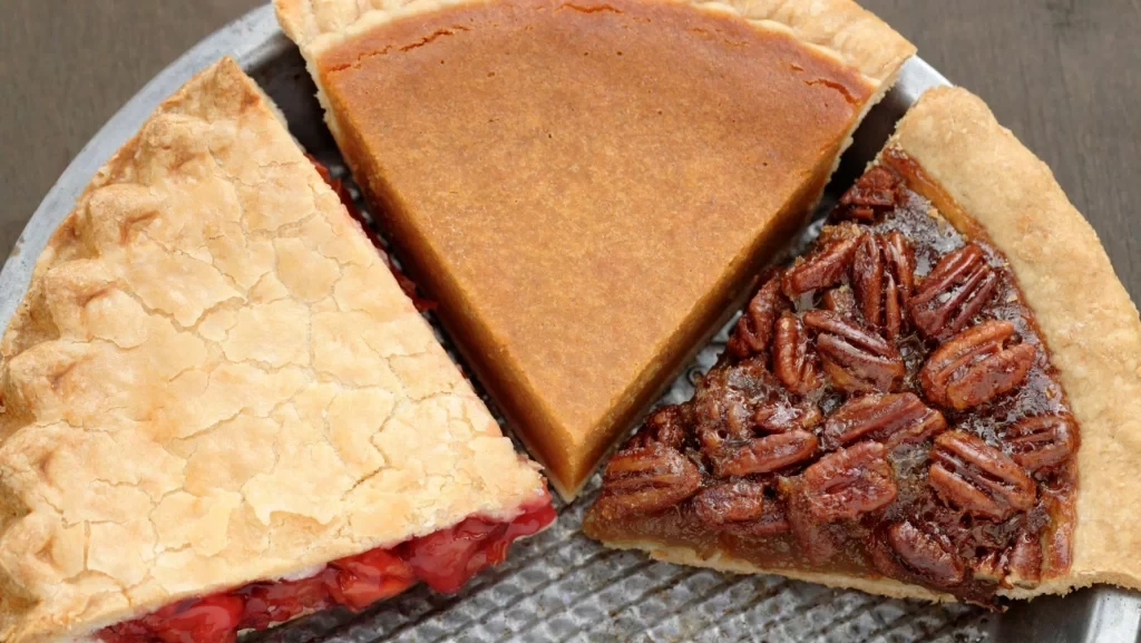 Pumpkin pie, pecan pie, and cherry pie