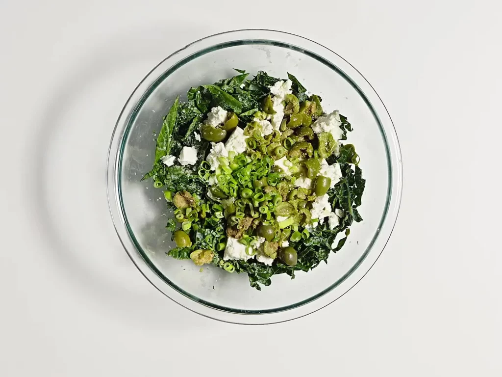 Lentil salad with kale, olives, feta and scallions