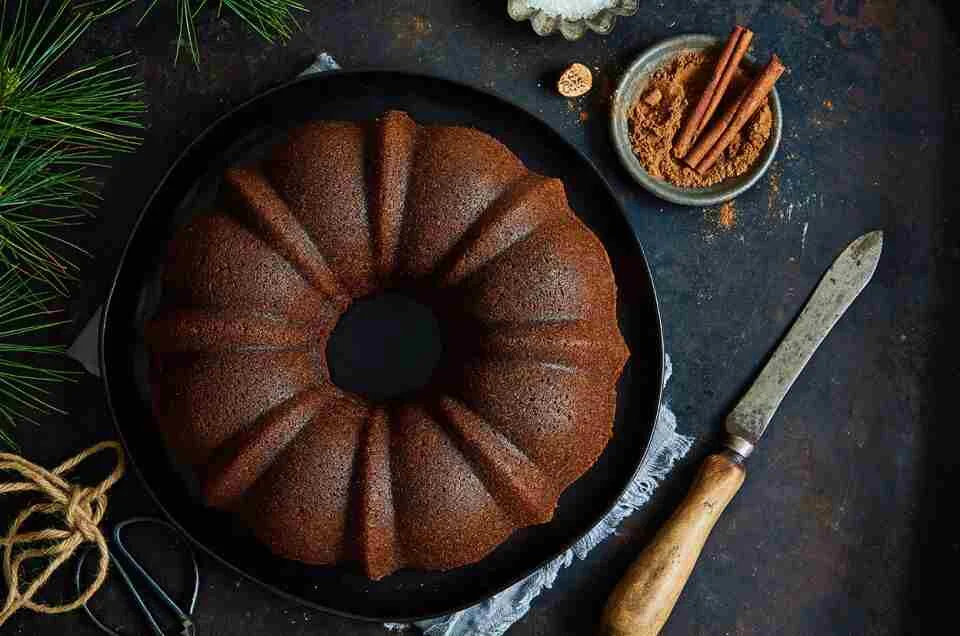gingerbread bundt cake with a knife at the side