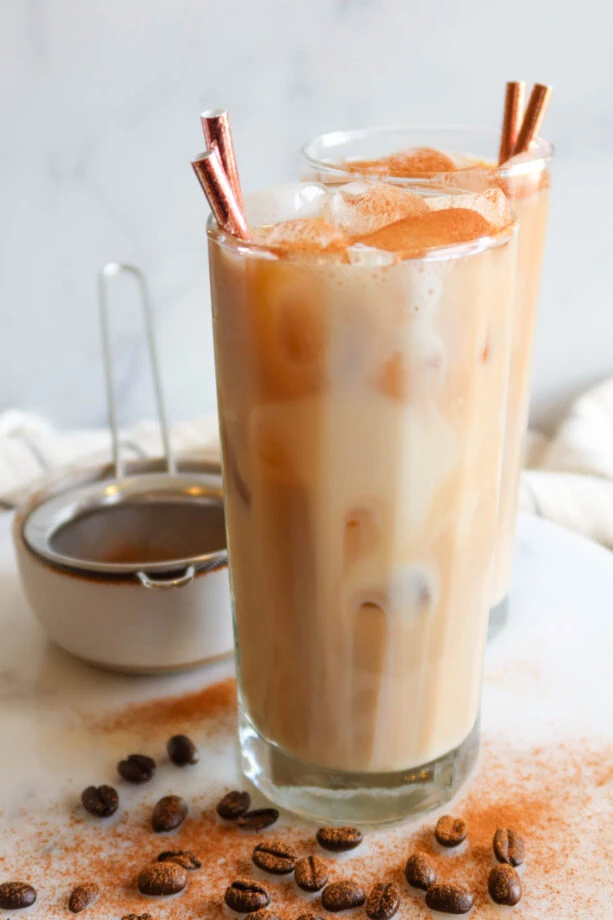 Protein shake garnished with a pinch of cinnamon