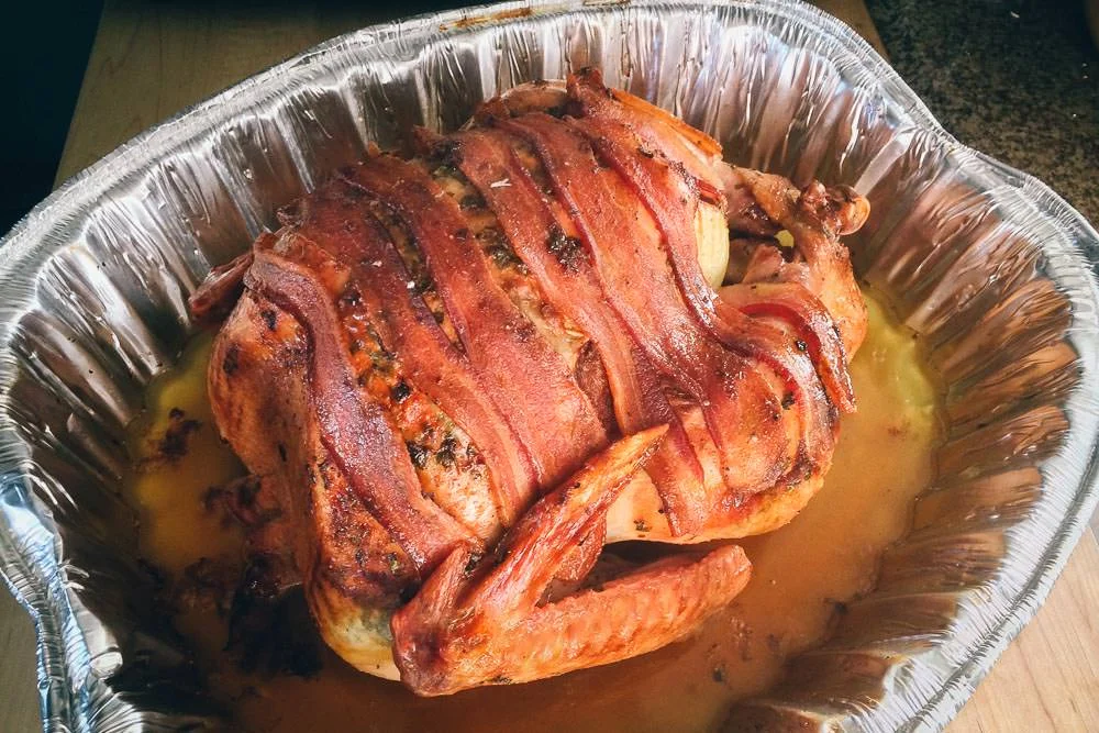 roast turkey topped with rashers of bacon