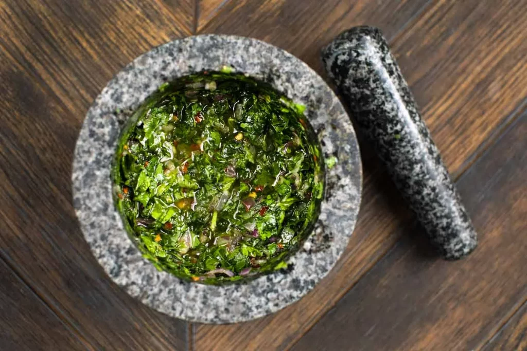 Chimichurri Sauce in a mortar and pestle