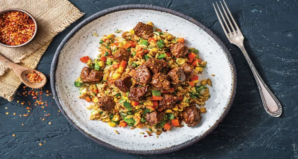 Stir fried beef with rice and vegetables