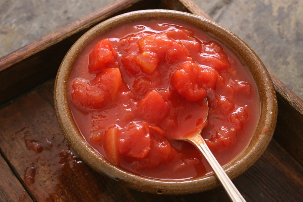 canned tomatoes in a bowl