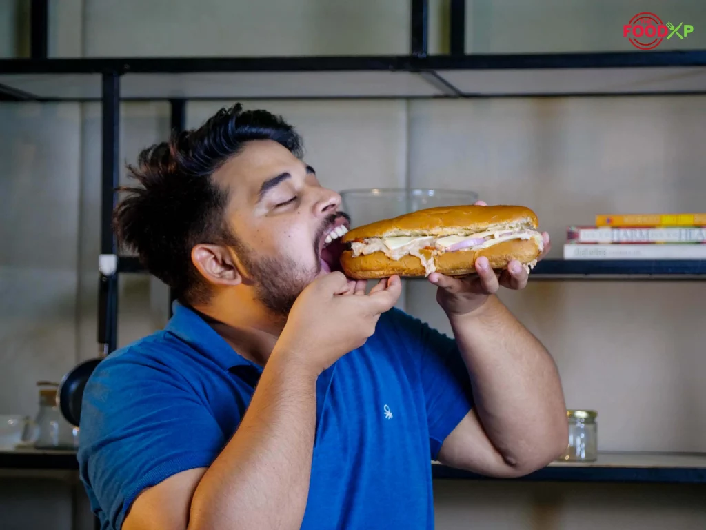Chef Jasbir Eating Tuna Sandwich