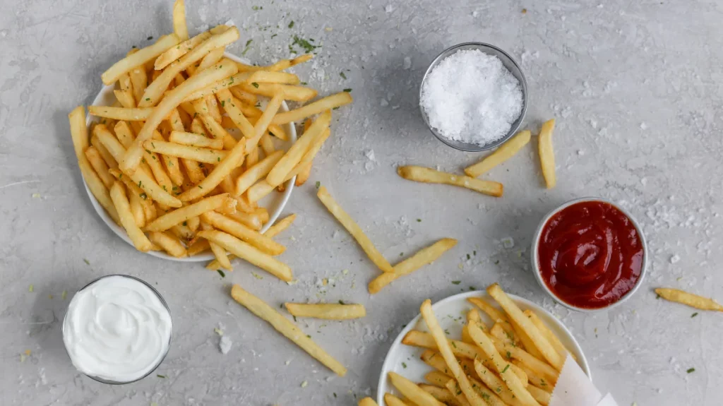 Crispy fries with salt and ketchup