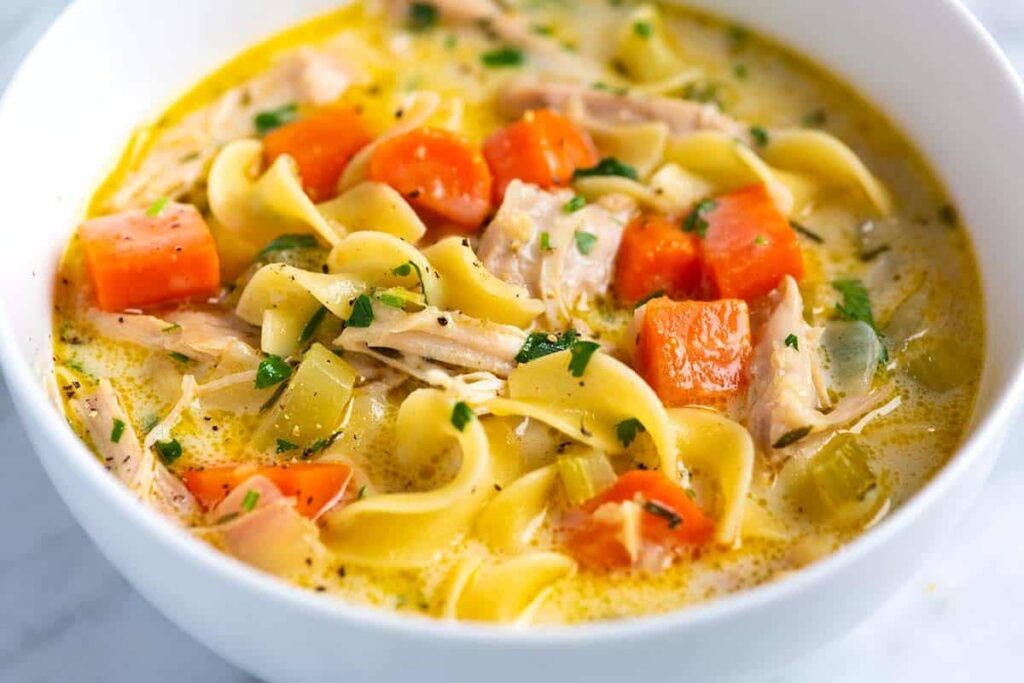 Chicken Noodle Soup In A White Bowl