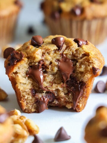 Banana Chocolate Chip Muffin with a bite missing.