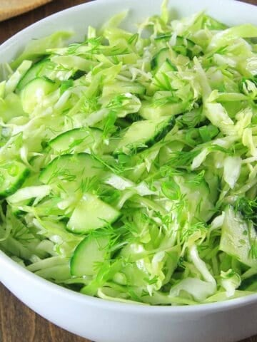 Close up of Cabbage Cucumber Salad with fresh dill