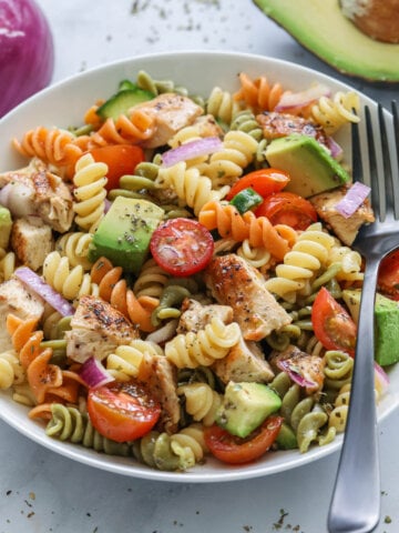 Chicken Pasta Salad in a bowl with a fork.