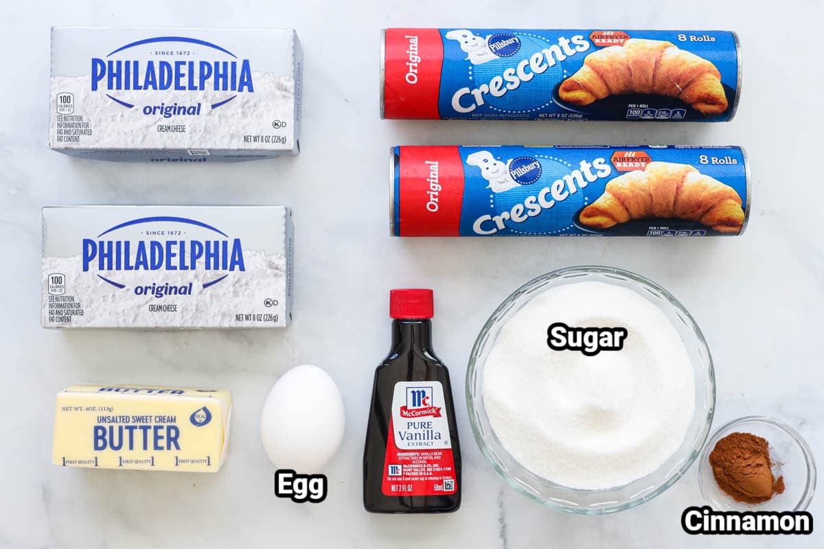 Ingredients for Sopapilla Cheesecake: cream cheese, butter, crescent dough, sugar, vanilla extract, egg, and cinnamon.