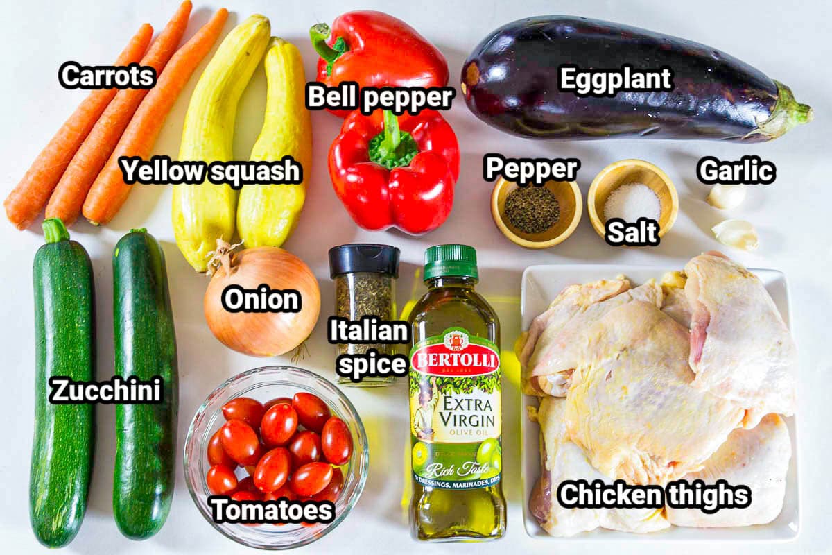 Ingredients for Paleo Chicken Casserole: carrots, yellow squash, zucchini, bell pepper, eggplant, onion, tomatoes, Italian spices, olive oil, garlic, chicken thighs, salt, and black pepper.
