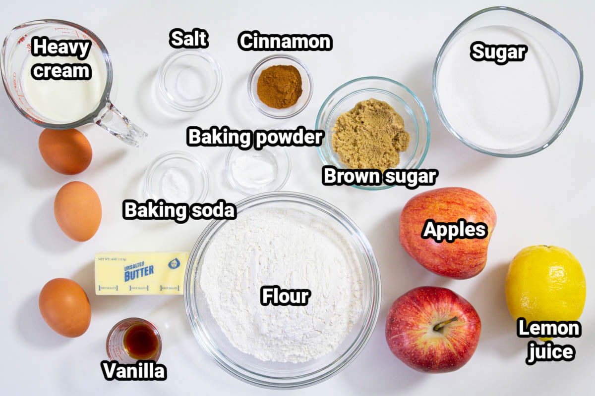 Ingredients for Cinnamon Apple Muffins: heavy cream, eggs, butter, vanilla, salt, cinnamon, baking powder, baking soda, brown sugar, apples, lemon, sugar, and flour.