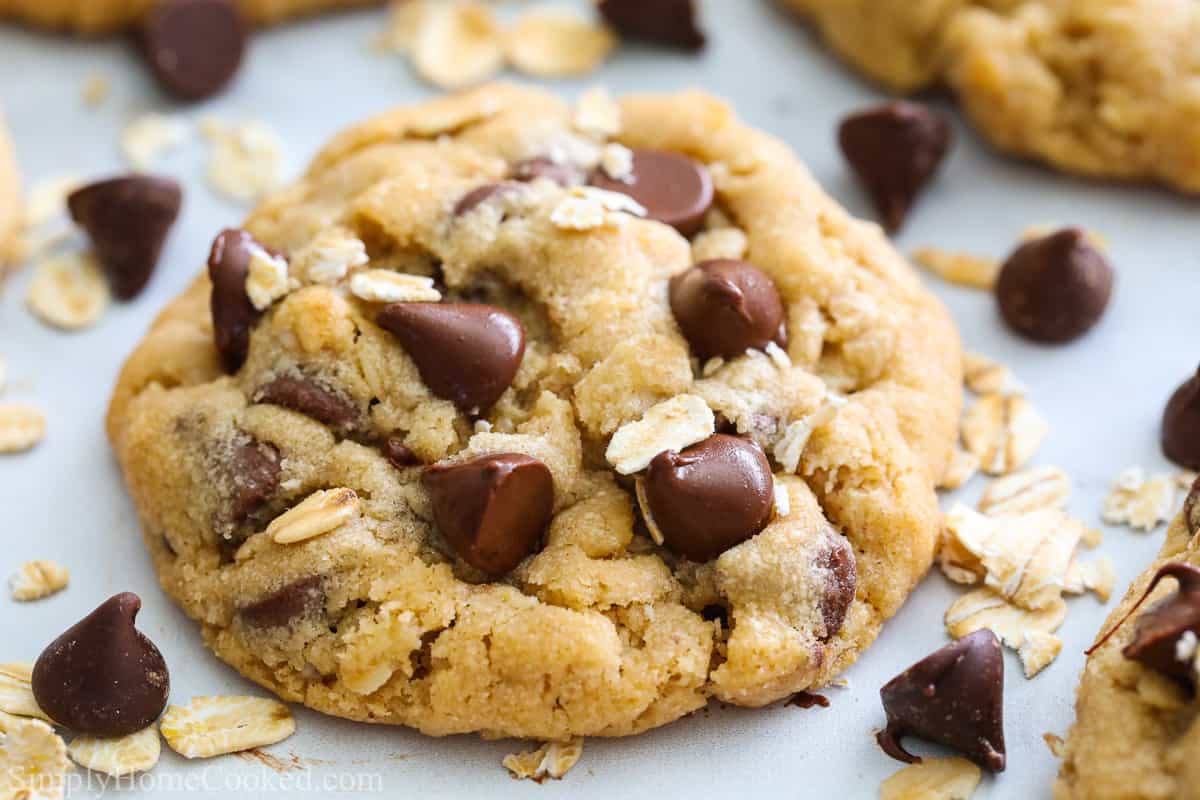 Close up of a Chewy Peanut Butter Oatmeal Cookie with chocolate chips.