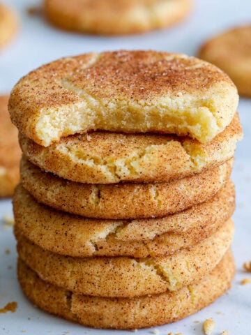 Stack of Snickerdoodle Cookies, the top one missing a bite.