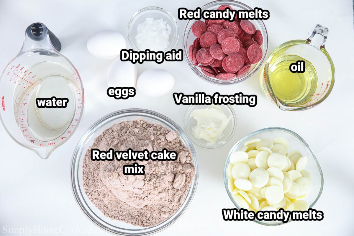 Ingredients for Red Velvet Cake Balls: water, red velvet cake mix, eggs, dipping aid, red candy melts, white candy melts, oil, and vanilla frosting.
